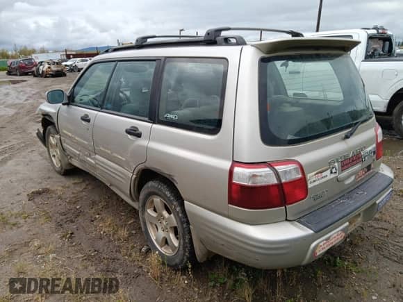2001 Subaru Forester S with VIN JF1SF65631H723339, listed as a Copart auction lot 69153995 with 180,657 mi miles and Salvage title. Bid and sale history available at DreamBid. Image 2.