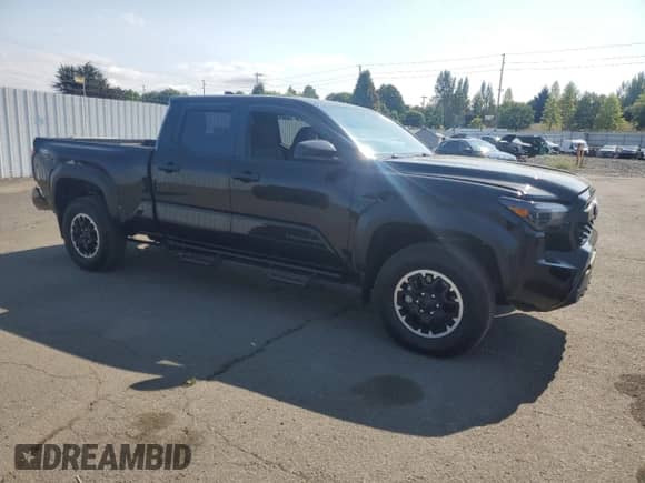 2024 Toyota Tacoma SR5 with VIN 3TMLB5JN9RM036603, listed as a Copart auction lot 80685075 with 4,301 mi miles and Salvage title. Bid and sale history available at DreamBid. Image 4.