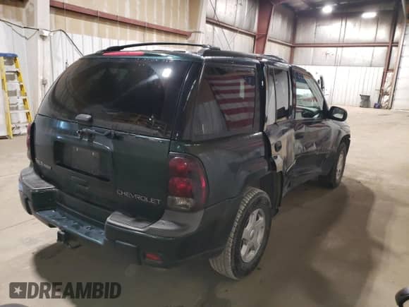 2002 Chevrolet TrailBlazer LS with VIN 1GNDT13S122487638, listed as a Copart auction lot 84998785 with 146,604 mi miles and Salvage title. Bid and sale history available at DreamBid. Image 3.