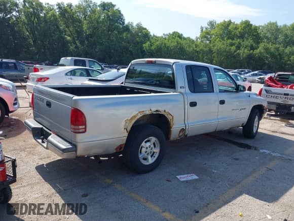 2001 Dodge Dakota Sport with VIN 1B7GL2AX11S118075, listed as a IAAI auction lot 42705551 with 363,644 mi miles and . Bid and sale history available at DreamBid. Image 4.