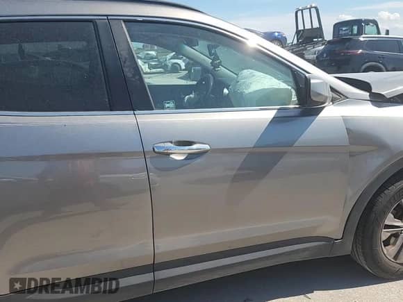 2016 Hyundai Santa Fe с VIN 5XYZU3LB5GG376675, выставлен на аукционе Copart как лот 70754365 с пробегом 145 019 миль миль и Списание • Salvage title. История ставок и продаж доступна на DreamBid. Изображение 14.