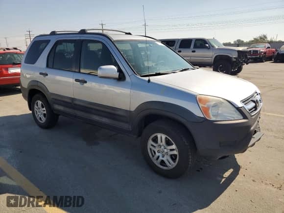 2002 Honda CR-V EX with VIN JHLRD78852C036088, listed as a Copart auction lot 70121155 with 166,996 mi miles and Salvage title. Bid and sale history available at DreamBid. Image 4.