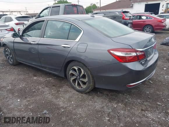 2017 Honda Accord EX-L with VIN 1HGCR2F86HA169751, listed as a IAAI auction lot 42470904 with 65,120 mi miles and . Bid and sale history available at DreamBid. Image 3.