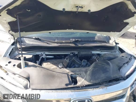 2022 Honda Pilot Touring 7-Passenger z VIN 5FNYF5H64NB015410, wystawiony jako IAAI lot #41776850 z przebiegiem 39 475 mil mil oraz . Historia ofert i sprzedaży dostępna na DreamBid. Obrazek 10.