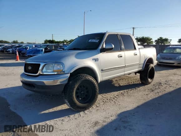 2003 Ford F-150 XLT z VIN 1FTRW08L23KB97346, wystawiony jako Copart lot #86121565 z przebiegiem Nie podano mil oraz Szkoda całkowita • Salvage title. Historia ofert i sprzedaży dostępna na DreamBid. Obrazek 1.