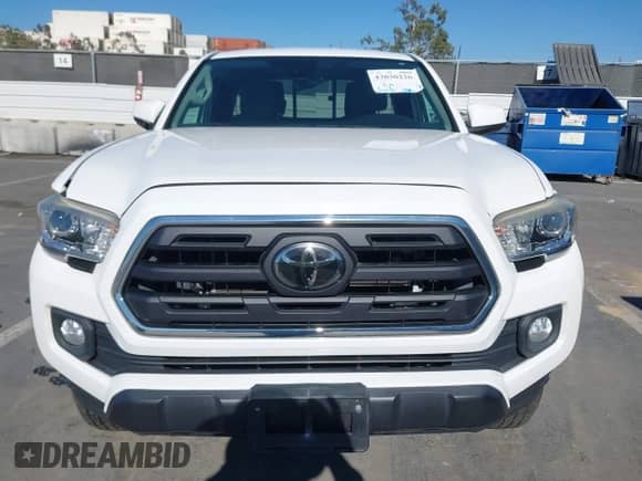 2018 Toyota Tacoma SR5 with VIN 5TFRZ5CNXJX063990, listed as a IAAI auction lot 43030226 with 62,935 mi miles and . Bid and sale history available at DreamBid. Image 13.