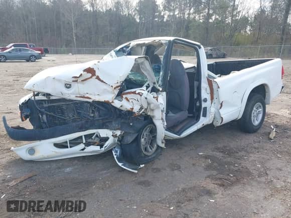 1998 Dodge Dakota SLT z VIN 1B7FL26X1WS716727, wystawiony jako IAAI lot #41748963 z przebiegiem Nie podano mil oraz . Historia ofert i sprzedaży dostępna na DreamBid. Obrazek 2.