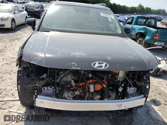 2024 Hyundai Santa Fe Limited z VIN 5NMP34G17RH014874, wystawiony jako Copart lot #54906395 z przebiegiem 59 mil mil oraz Szkoda całkowita • Salvage title. Historia ofert i sprzedaży dostępna na DreamBid. Obrazek 5.