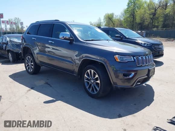 2017 Jeep Grand Cherokee Overland with VIN 1C4RJFCG0HC602990, listed as a IAAI auction lot 41998539 with 170,640 mi miles and . Bid and sale history available at DreamBid. Image 1.