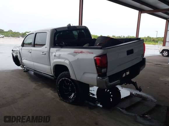 2019 Toyota Tacoma SR5 with VIN 3TMAZ5CNXKM083578, listed as a IAAI auction lot 43042029 with 86,848 mi miles and . Bid and sale history available at DreamBid. Image 3.