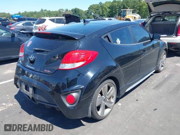 2013 Hyundai Veloster Turbo с VIN KMHTC6AE3DU152799, выставлен на аукционе IAAI как лот 43142353 с пробегом 121 931 миль миль и . История ставок и продаж доступна на DreamBid. Изображение 4.