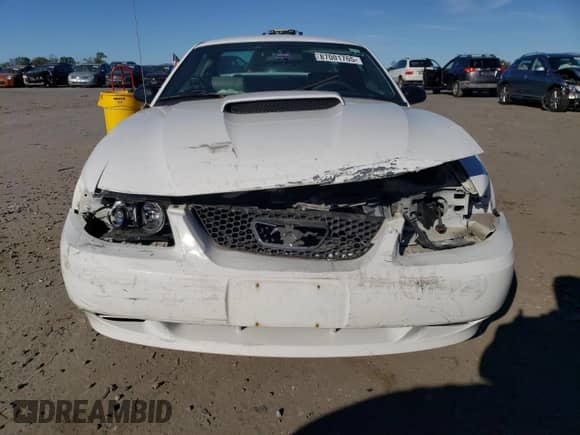 2003 Ford Mustang Standard z VIN 1FAFP40463F419400, wystawiony jako Copart lot #87001765 z przebiegiem 159 233 mil mil oraz Czysty tytuł • Clean title. Historia ofert i sprzedaży dostępna na DreamBid. Obrazek 5.