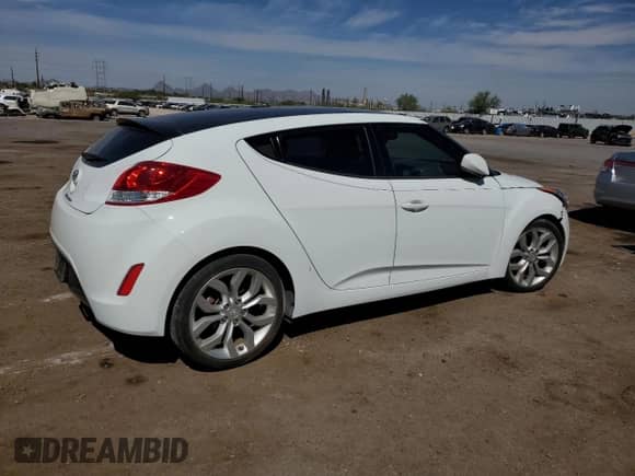 2013 Hyundai Veloster w/Gray Int z VIN KMHTC6AD9DU162101, wystawiony jako Copart lot #71926675 z przebiegiem 44 981 mil mil oraz Szkoda całkowita • Salvage title. Historia ofert i sprzedaży dostępna na DreamBid. Obrazek 3.