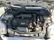 2013 MINI Hardtop with VIN WMWSU3C52DT680782, listed as a Copart auction lot 61779515 with 94,378 mi miles and Salvage title. Bid and sale history available at DreamBid. Image 11.