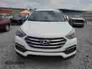 2018 Hyundai Santa Fe 2.4L с VIN 5NMZT3LB6JH092892, выставлен на аукционе Copart как лот 68391685 с пробегом 104 619 миль миль и Списание • Salvage title. История ставок и продаж доступна на DreamBid. Изображение 5.