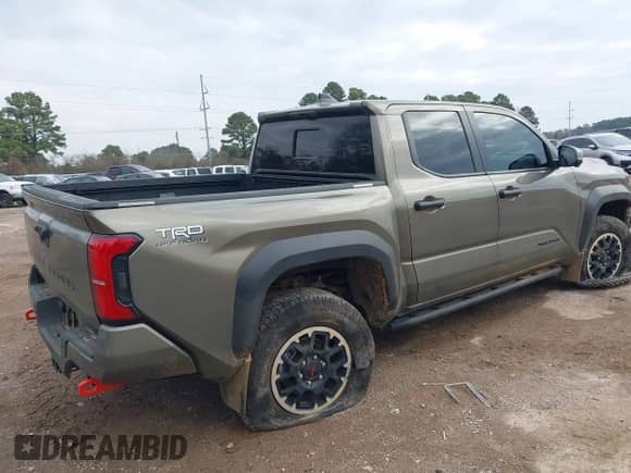 2024 Toyota Tacoma SR5 with VIN 3TMLB5JN2RM044896, listed as a IAAI auction lot 41575173 with 4,293 mi miles and . Bid and sale history available at DreamBid. Image 4.