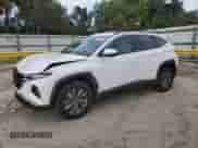 2022 Hyundai Tucson Blue with VIN KM8JBCA12NU056315, listed as a Copart auction lot 84553955 with 35,126 mi miles and Salvage title. Bid and sale history available at DreamBid. Image 1.