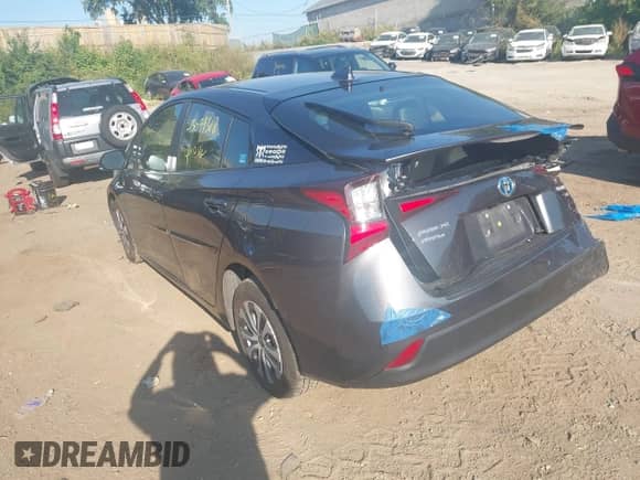2021 Toyota Prius LE with VIN JTDL9MFU8M3028928, listed as a IAAI auction lot 43099318 with 72,833 mi miles and . Bid and sale history available at DreamBid. Image 3.