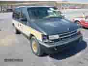 1993 Dodge Caravan with VIN 2B4GH55R8PR128883, listed as a IAAI auction lot 42553216 with 222,244 mi miles and . Bid and sale history available at DreamBid. Image 1.
