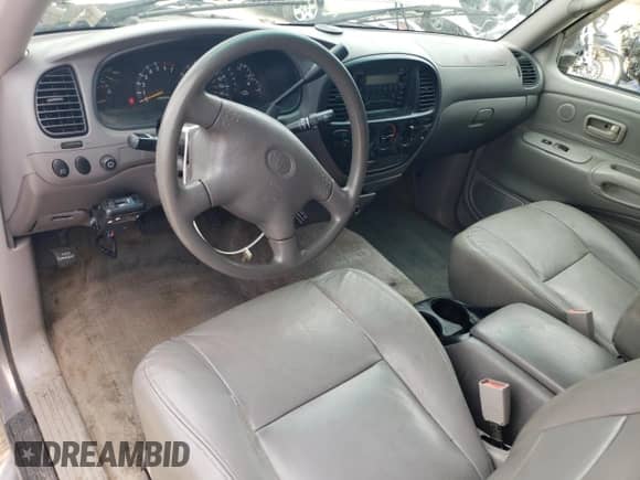 2002 Toyota Tundra SR5 z VIN 5TBBT44162S322399, wystawiony jako Copart lot #84236555 z przebiegiem 231 241 mil mil oraz Szkoda całkowita • Salvage title. Historia ofert i sprzedaży dostępna na DreamBid. Obrazek 8.