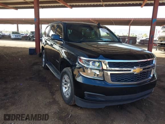 2015 Chevrolet Tahoe LS with VIN 1GNSCAKC0FR711917, listed as a IAAI auction lot 43241350 with 181,124 mi miles and . Bid and sale history available at DreamBid. Image 1.