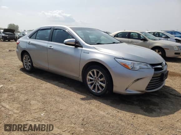 2015 Toyota Camry LE с VIN 4T1BD1FK4FU166997, выставлен на аукционе Copart как лот 67981695 с пробегом 66 416 миль миль и Списание • Salvage title. История ставок и продаж доступна на DreamBid. Изображение 4.