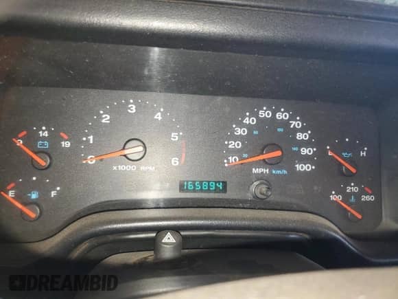 2004 Jeep Wrangler Sport z VIN 1J4FA49S14P768676, wystawiony jako Copart lot #69976745 z przebiegiem 165 894 mil mil oraz Szkoda całkowita • Salvage title. Historia ofert i sprzedaży dostępna na DreamBid. Obrazek 9.