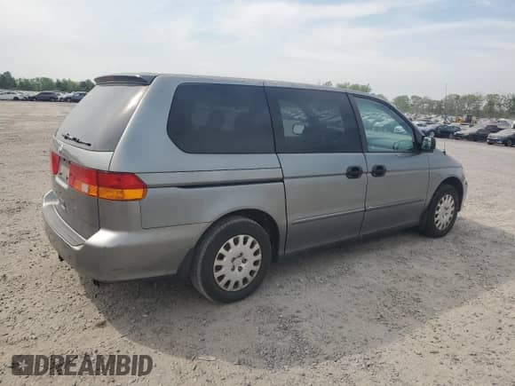 2002 Honda Odyssey LX with VIN 2HKRL18572H531397, listed as a Copart auction lot 54533535 with 241,052 mi miles and Clean title. Bid and sale history available at DreamBid. Image 3.