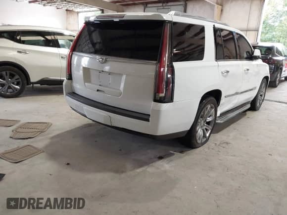 2015 Cadillac Escalade Luxury with VIN 1GYS3MKJ1FR579561, listed as a IAAI auction lot 43325233 with 179,651 mi miles and . Bid and sale history available at DreamBid. Image 4.
