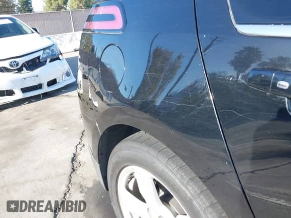 2015 Chevrolet Volt z VIN 1G1RD6E43FU102560, wystawiony jako IAAI lot #43595883 z przebiegiem 106 638 mil mil oraz . Historia ofert i sprzedaży dostępna na DreamBid. Obrazek 15.