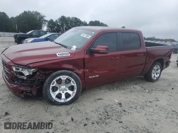 2023 Ram 1500 Lone Star with VIN 1C6SRFFT2PN704918, listed as a Copart auction lot 68173665 with 23,834 mi miles and Salvage title. Bid and sale history available at DreamBid. Image 1.