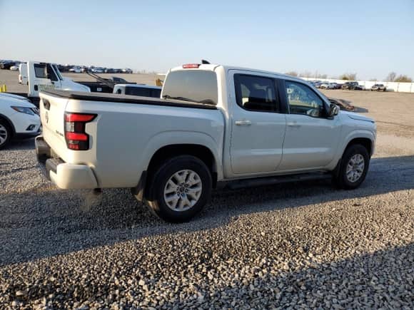 2022 Nissan Frontier S with VIN 1N6ED1EK3NN685998, listed as a Copart auction lot 65903275 with 25,288 mi miles and Salvage title. Bid and sale history available at DreamBid. Image 3.