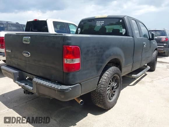 2005 Ford F-150 STX with VIN 1FTRX12W65NB37237, listed as a IAAI auction lot 42677022 with 311,210 mi miles and . Bid and sale history available at DreamBid. Image 4.