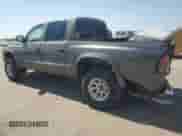 2002 Dodge Dakota SLT with VIN 1B7HG48N02S633708, listed as a Copart auction lot 80820345 with 182,965 mi miles and Salvage title. Bid and sale history available at DreamBid. Image 2.