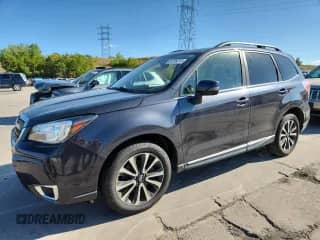 2017 Subaru Forester Touring z VIN JF2SJGWC1HH551911, wystawiony jako Copart lot #84236215 z przebiegiem 59 041 mil mil oraz Czysty tytuł • Clean title. Historia ofert i sprzedaży dostępna na DreamBid. Obrazek 1.