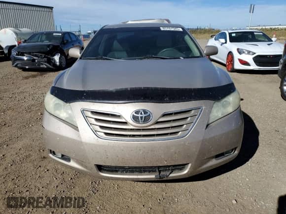 2007 Toyota Camry XLE with VIN 4T1BK46K17U506745, listed as a Copart auction lot 85707585 with 214,664 mi miles and Salvage title. Bid and sale history available at DreamBid. Image 5.