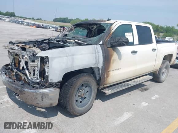 2014 Chevrolet Silverado 1500 LT with VIN 3GCUKREH9EG393627, listed as a IAAI auction lot 42423115 with Not provided miles and . Bid and sale history available at DreamBid. Image 2.
