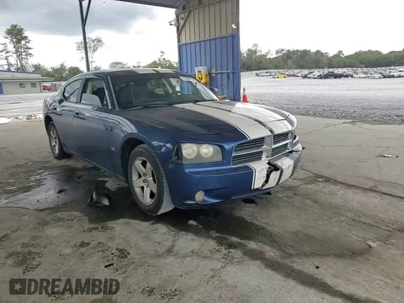 2009 Dodge Charger SXT с VIN 2B3KA33V79H514212, выставлен на аукционе Copart как лот 73103164 с пробегом 211 375 миль миль и Списание • Salvage title. История ставок и продаж доступна на DreamBid. Изображение 11.
