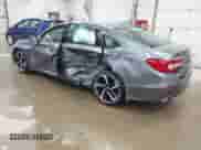 2018 Honda Accord Sport with VIN 1HGCV2E35JA010825, listed as a IAAI auction lot 42672744 with 56,228 mi miles and . Bid and sale history available at DreamBid. Image 3.