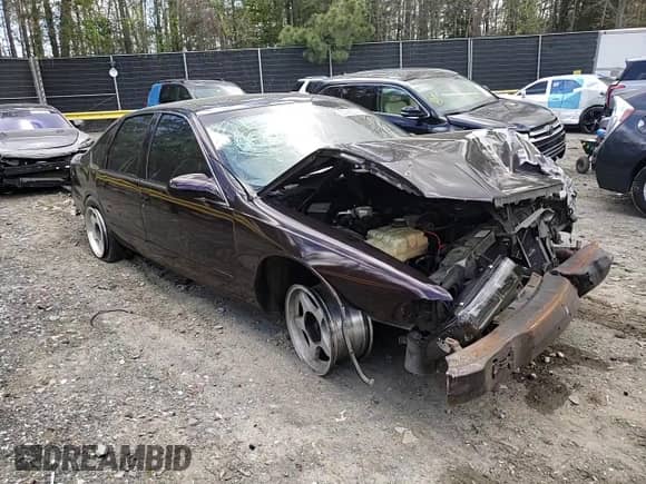 1996 Chevrolet Caprice 1SA Special Value с VIN 1G1BL52P1TR125640, выставлен на аукционе Copart как лот 53086055 с пробегом Не указан миль и Списание • Salvage title. История ставок и продаж доступна на DreamBid. Изображение 11.