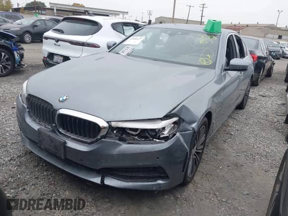 2019 BMW 5 Series 530e with VIN WBAJA9C58KB389357, listed as a IAAI auction lot 42956477 with 60,507 mi miles and . Bid and sale history available at DreamBid. Image 18.