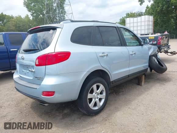 2007 Hyundai Santa Fe SE z VIN 5NMSH73E17H075477, wystawiony jako IAAI lot #42881277 z przebiegiem 284 592 mil mil oraz . Historia ofert i sprzedaży dostępna na DreamBid. Obrazek 4.