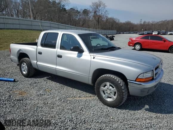 2001 Dodge Dakota Sport with VIN 1B7GL2AX01S126636, listed as a Copart auction lot 48332505 with 175,866 mi miles and Salvage title. Bid and sale history available at DreamBid. Image 4.