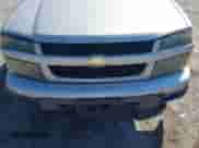 2010 Chevrolet Colorado 1LT z VIN 1GCDSCDE7A8140360, wystawiony jako IAAI lot #42660572 z przebiegiem 147 641 mil mil oraz . Historia ofert i sprzedaży dostępna na DreamBid. Obrazek 6.