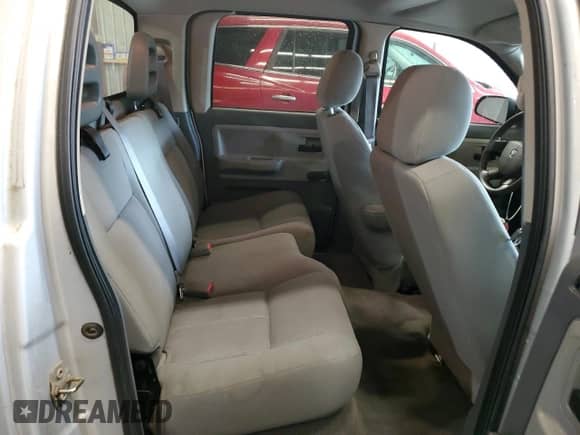 2006 Dodge Dakota ST with VIN 1D7HW28K36S507044, listed as a Copart auction lot 61255725 with 117,459 mi miles and Salvage title. Bid and sale history available at DreamBid. Image 10.