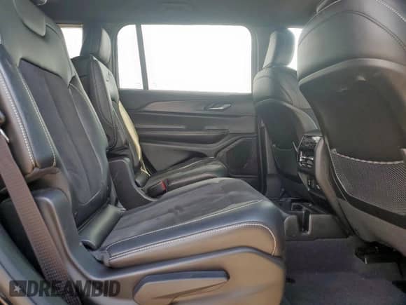 2023 Jeep Grand Cherokee Altitude z VIN 1C4RJJAGXP8795835, wystawiony jako Copart lot #66524195 z przebiegiem 44 606 mil mil oraz Szkoda całkowita • Salvage title. Historia ofert i sprzedaży dostępna na DreamBid. Obrazek 11.