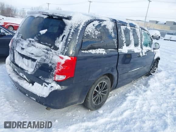 2014 Dodge Grand Caravan SXT with VIN 2C4RDGBG1ER420765, listed as a IAAI auction lot 40986661 with 167,365 mi miles and . Bid and sale history available at DreamBid. Image 4.