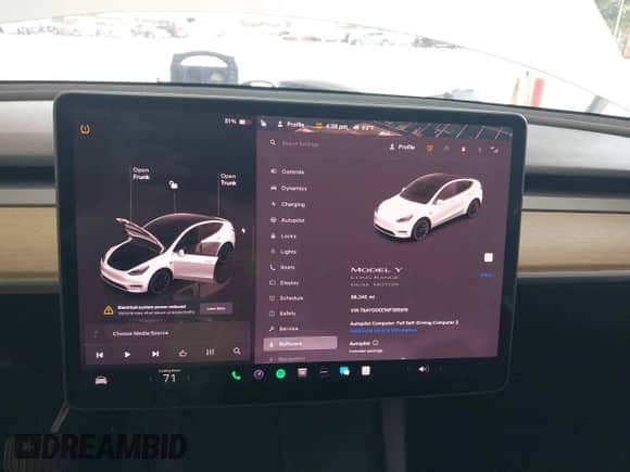 2022 Tesla Model Y Long Range z VIN 7SAYGDEE1NF385915, wystawiony jako IAAI lot #42458295 z przebiegiem 68 345 mil mil oraz . Historia ofert i sprzedaży dostępna na DreamBid. Obrazek 7.