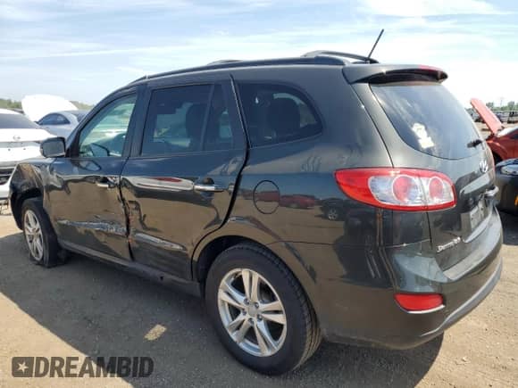 2012 Hyundai Santa Fe Limited с VIN 5XYZK4AG6CG103717, выставлен на аукционе Copart как лот 65180475 с пробегом 90 083 миль миль и Списание • Salvage title. История ставок и продаж доступна на DreamBid. Изображение 2.