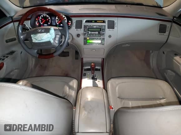 2007 Hyundai Azera SE с VIN KMHFC46F97A181619, выставлен на аукционе Copart как лот 82775754 с пробегом 198 730 миль миль и Списание • Salvage title. История ставок и продаж доступна на DreamBid. Изображение 8.